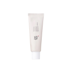 Beige cosmetic tube of Beauty of Joseon Relief Sun Rice + Probiotics SPF50+ PA++++ with white cap and printed text in English and Korean.