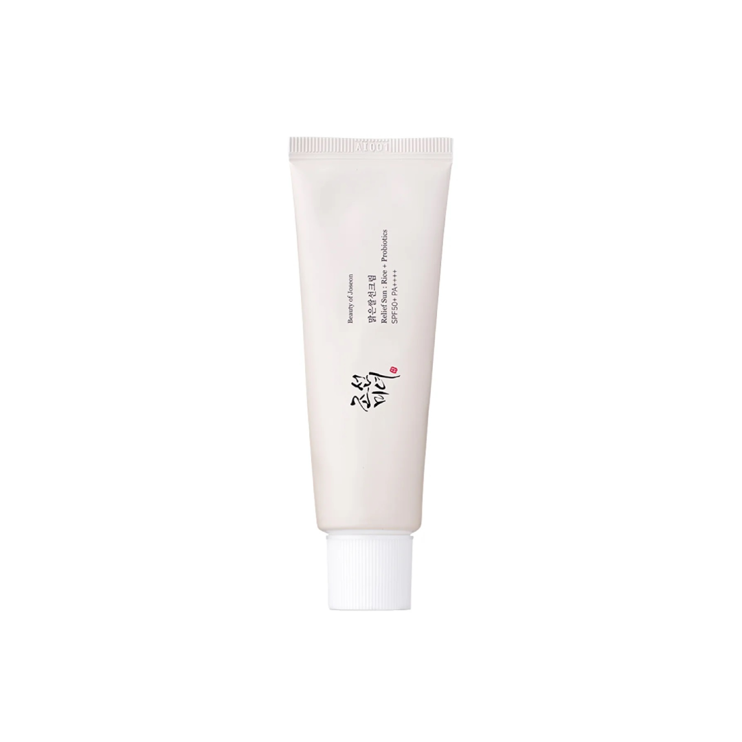 Beauty of Joseon Relief Sun : Rice + Probiotics SPF50+ PA++++ Beige cosmetic tube of Beauty of Joseon Relief Sun Rice + Probiotics SPF50+ PA++++ with white cap and printed text in English and Korean.