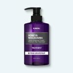 Kundal Honey & Macadamia Hair Treatment Pink Grapefruit 500ml bottle, designed for deep conditioning and shine.